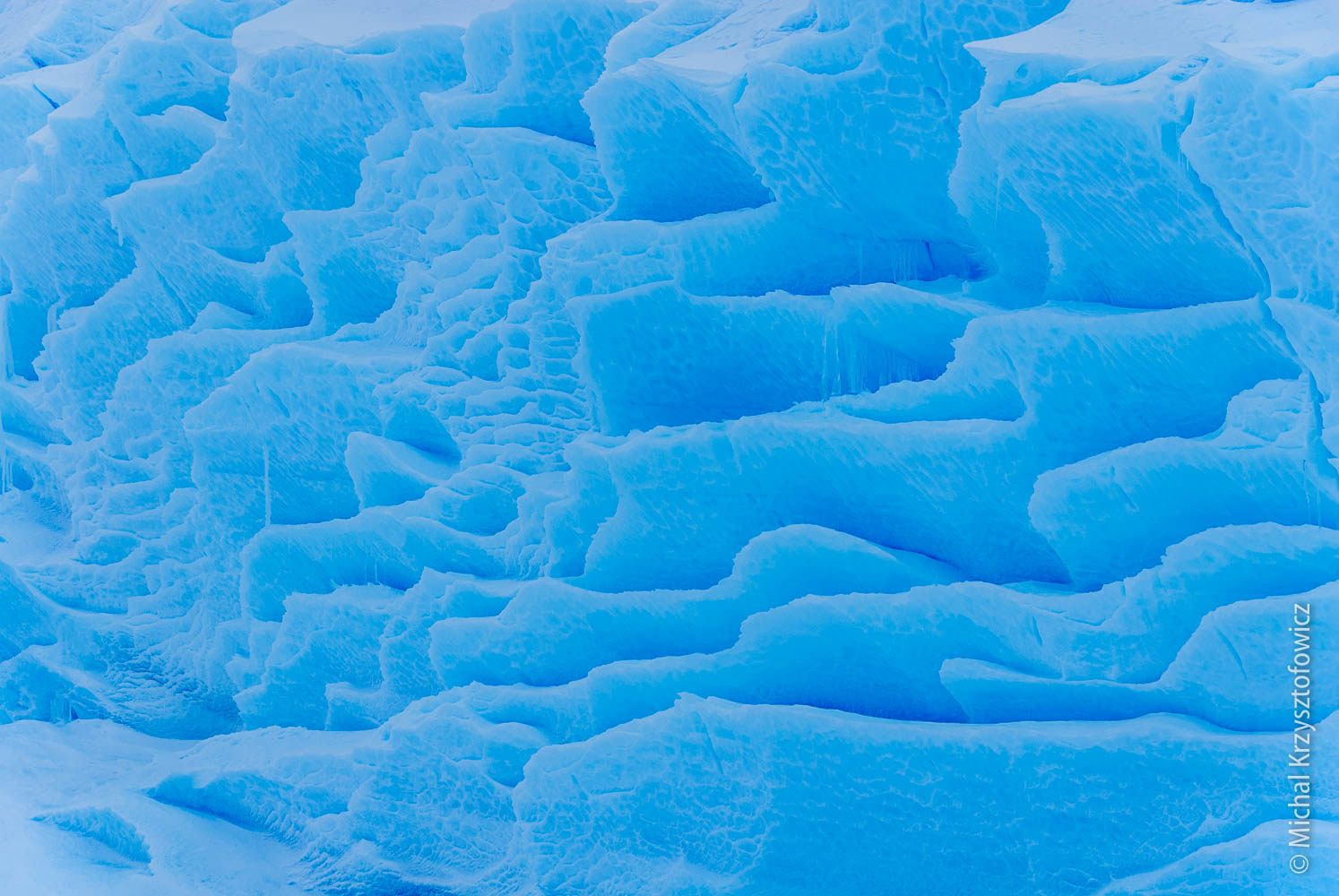 Fish-scale like features on ice wall
