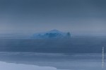 An iceberg on steaming sea